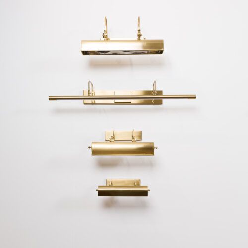 modern and traditional brass picture lighting for art work gallery display