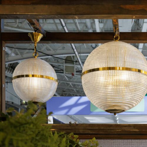 Decorex 2022 best stand winner Pure White Lines - Parisian globe lights - Holophane inspired