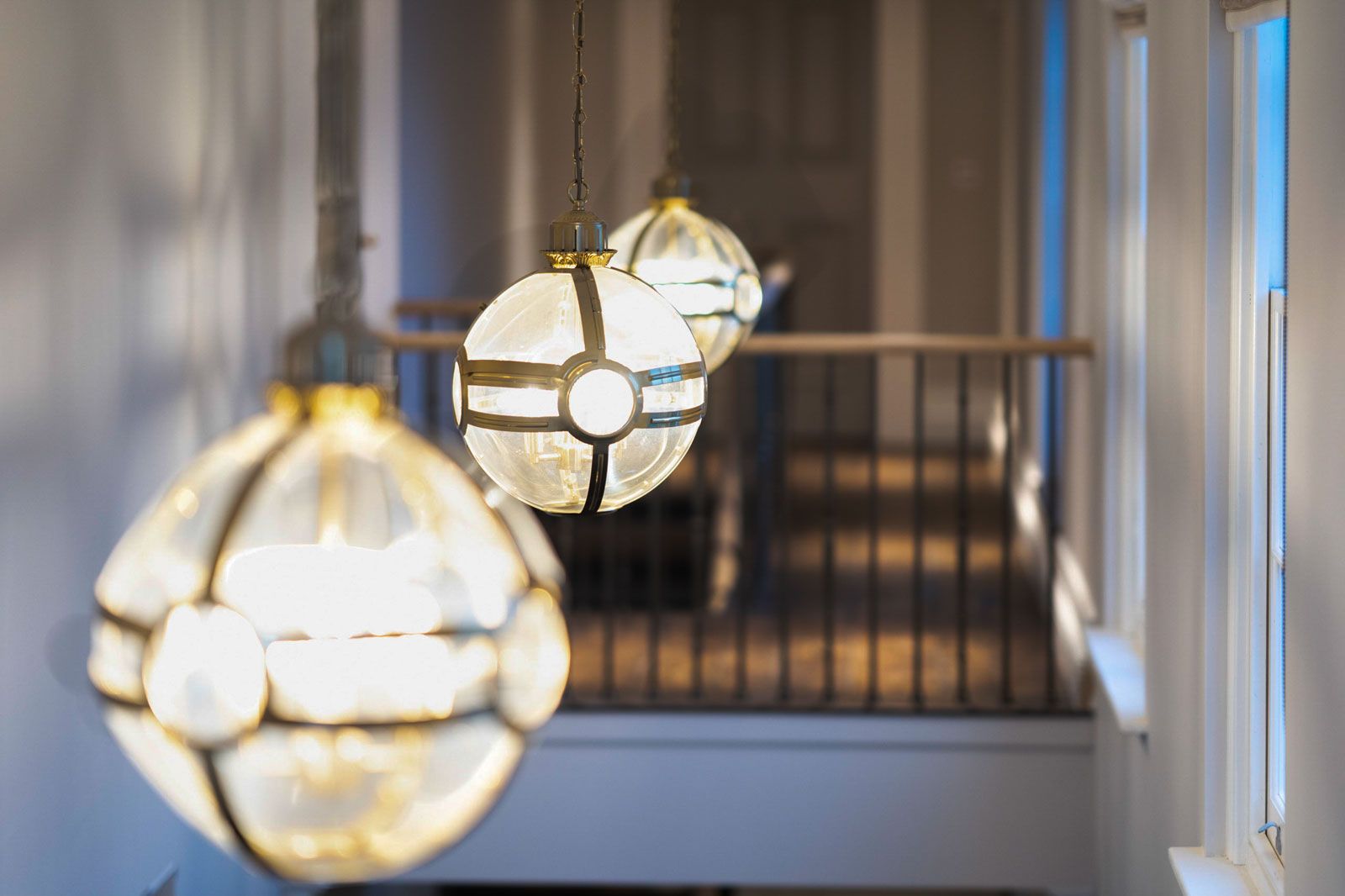 Tilehouse Studio - luxury interior design home countries country manor house - Georgian renovation - hanging globe lanterns in stairwell