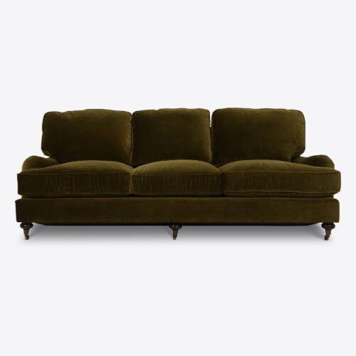 Baxter sofa - a traditional sofa on castors and upholstered in moss green coloured velvet