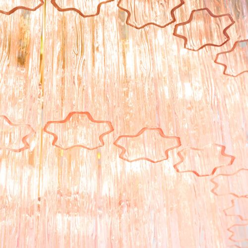 Treviso mid-century inspired tiered glass chandelier in clear smoked quartz or pink glass