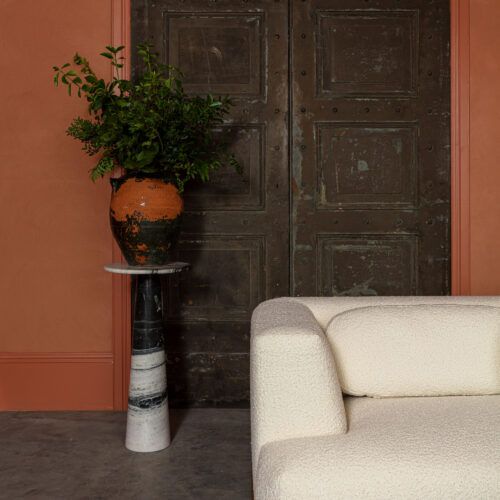 Toulouse tall display table in solid black and white marble