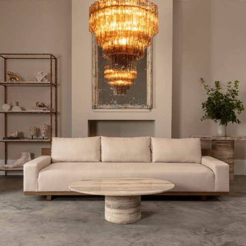 Argent travertine solid coffee table in an oval shape