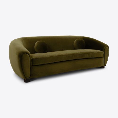 mid-century inspired velvet sofa in green